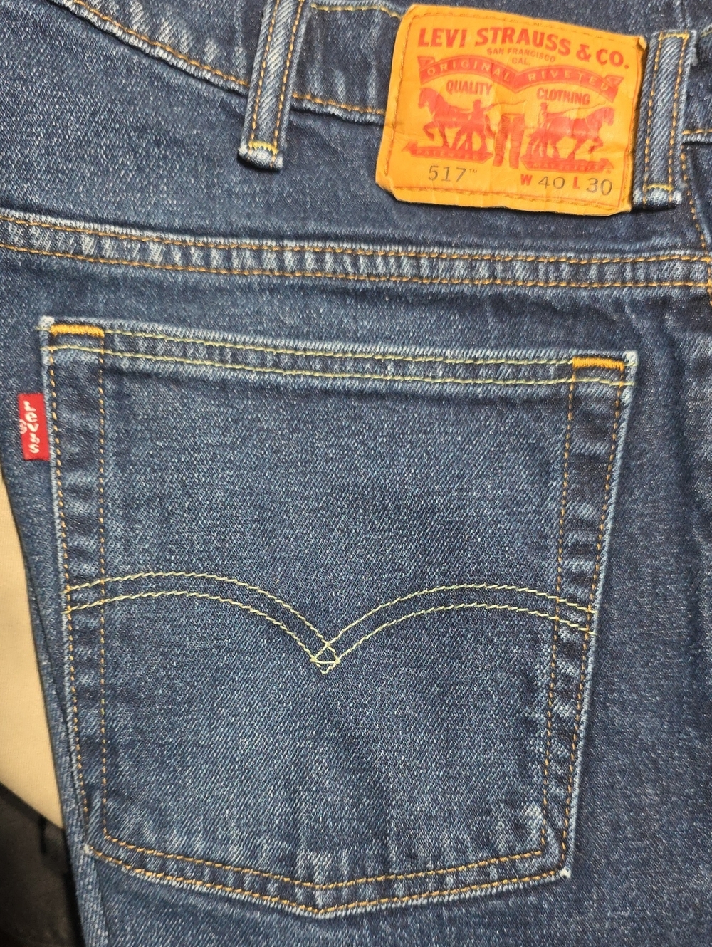 Levi's blue denim jeans with yellow stitching